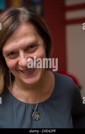 Poland, Polen, Europe, Europa; Portrait of mature woman with a pendant around her neck. Porträt einer reifen Frau mit einem Anhänger um den Hals. Stock Photo