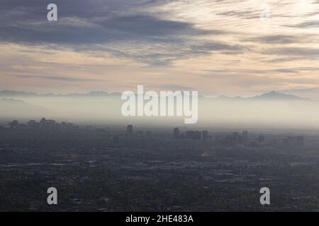 Aerial Landscape View Smog Pollution Layer Over Metropolitan City of Phoenix Valley from summit of Piestewa Peak in Phoenix Arizona Mountain Preserve Stock Photo