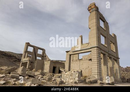 Bank Building Ruins in Rhyolite Ghost Town, Relic of Bygone Gold Rush Mining Days, in Nevada USA near Death Valley National Park Stock Photo