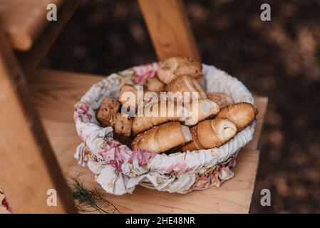 Close-up shot of fresh bakery products on a wooden table Stock Photo