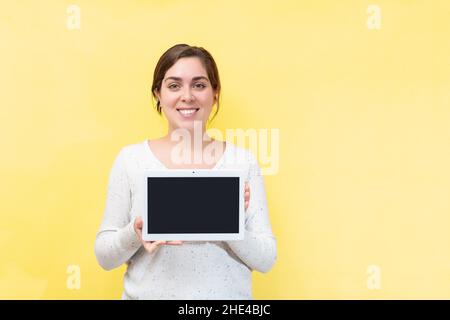 Shows her body. Young caucasian woman is indoors at daytime Stock Photo -  Alamy