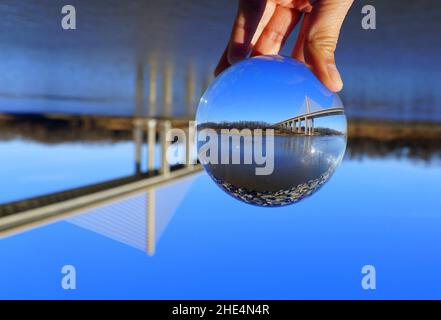 The William V Roth Bridge captured through a crystal lens ball near Middletown, Delaware, U.S.A Stock Photo