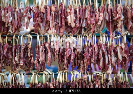 sun dried pork recipe in Thai food before grill of boil in street food faverite menu. Stock Photo