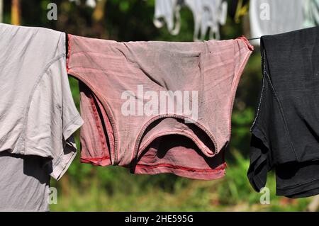 Clothesline in a traditional village in West Java, Indonesia Stock Photo