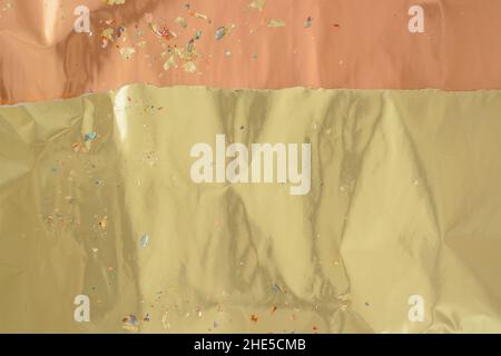 Background with gold and copper sheets, copy space, horizontal format Stock Photo