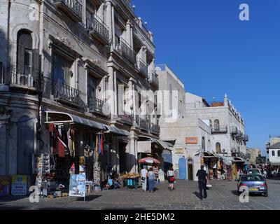 Marketplace in the Old City of Jerusalem, near the entrance through Jaffa Gate, with buildings from the Turkish period Stock Photo