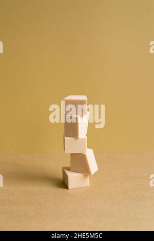 Stack of makeup sponge on brown table background Stock Photo