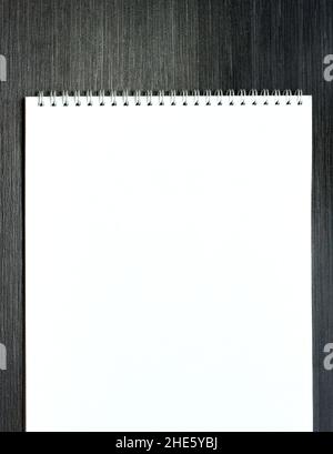 Blank open notepad for  sketching  on wooden table Stock Photo