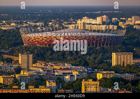 Warsaw aerial view cityscape with the National Stadium (Polish: Stadion Narodowy, PGE Narodowy) at sunset, capital city of Poland. Stock Photo