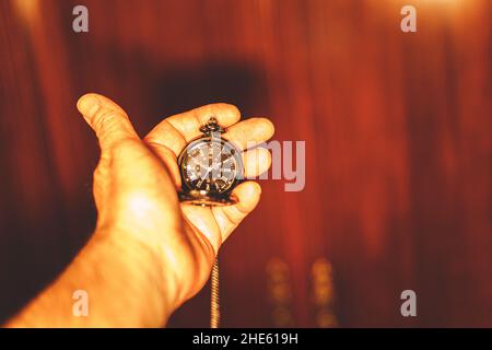 hand showing a watch Stock Photo