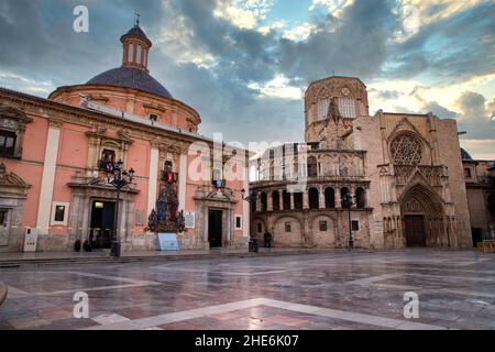 VALENCIA , SPAIN - DECEMBER 6, 2021: Square of Saint Mary's with Valencia Cathedral Temple, Basilica de la nuestra senora de los desamparados and the Stock Photo