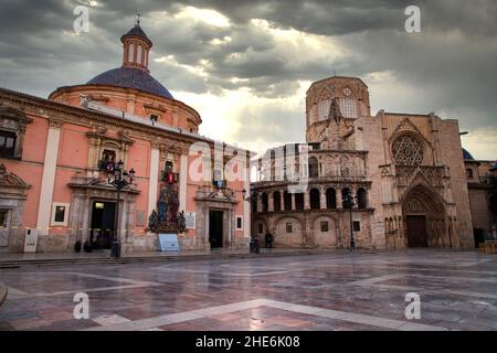 VALENCIA , SPAIN - DECEMBER 6, 2021: Square of Saint Mary's with Valencia Cathedral Temple, Basilica de la nuestra senora de los desamparados and the Stock Photo