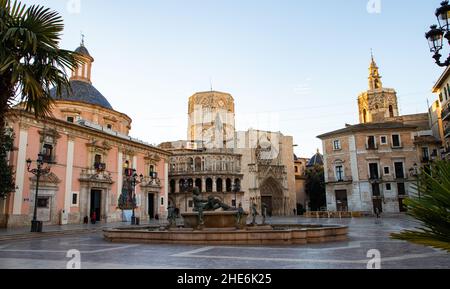 VALENCIA , SPAIN - DECEMBER 6, 2021: Square of Saint Mary's with Valencia Cathedral Temple, Basilica de la nuestra senora de los desamparados and the Stock Photo