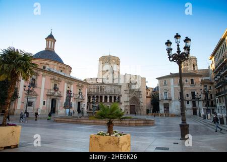 VALENCIA , SPAIN - DECEMBER 6, 2021: Square of Saint Mary's with Valencia Cathedral Temple, Basilica de la nuestra senora de los desamparados and the Stock Photo