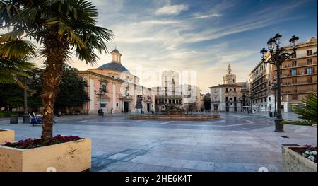 VALENCIA , SPAIN - DECEMBER 6, 2021: Square of Saint Mary's with Valencia Cathedral Temple, Basilica de la nuestra senora de los desamparados and the Stock Photo