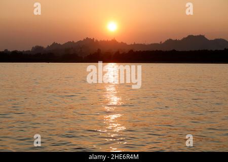 Cox's Bazar, Bangladesh - December 31, 2021: Sunset over the Sea beach at Saint Martin Island in Cox’s Bazar. “Bangladesh is a gorgeous damsel and the Stock Photo