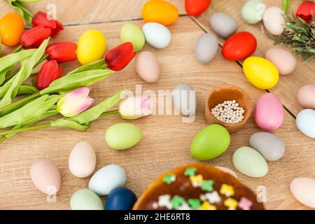 Easter cake and colorful eggs on festive Easter table Stock Photo