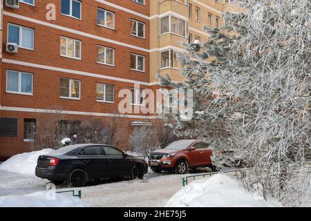 Moscow, Russia - Dec 29. 2021. In courtyard of a multi-storey building in winter Stock Photo