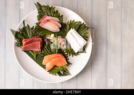 The Sashimi Moriawase is a combination of fine cuts of fish and seafood selected so that you can enjoy the best quality Stock Photo