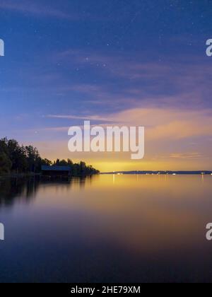 Starry sky at the lake, Bavaria, Germany Stock Photo