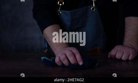 Close up shot of hand of man cleaning in kitchen,Housekeeping. Stock Photo