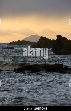 Dunure, Ayrshire, Scotland, UK Waves crashing onto the rocky shore on a winters day on the Ayrshire Coast , Firth of Clyde Stock Photo