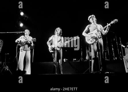 Dave Swarbrick, Dave Pegg and Simon Nicol of Fairport Convention performing in London in 1977. Stock Photo