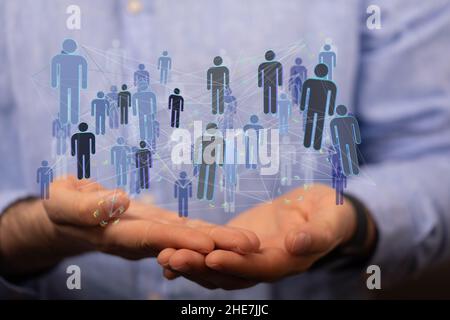 Male hand drawing organization chart with team networking concept Stock Photo