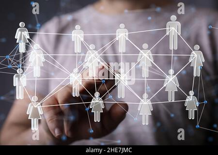 Male hand drawing organization chart with team networking concept Stock Photo