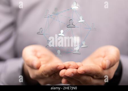 Male hands and a cloud network of team concept Stock Photo