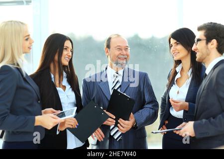 successful and happy business team with documents in office Stock Photo