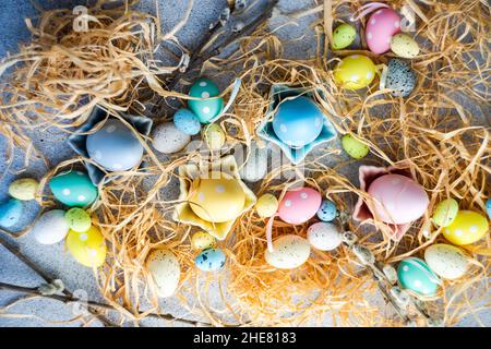 Easter frame made with colorful eggs on concrete background Stock Photo