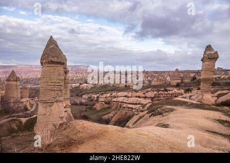 Scenic landscape of Turkish Cappadocia. Weathering stone pillars in a valley near Goreme Stock Photo