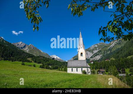 Idyllic branch church St. Georg in Kals am Grossglockner, East Tyrol, Tyrol, Austria, Europe Stock Photo