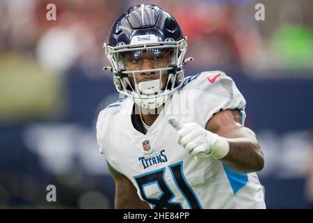 Tennessee Titans wide receiver Racey McMath (13) goes for a catch as he's  defended by Tampa Bay Buccaneers cornerback Dee Delaney (30) during their  game Saturday, Aug. 20, 2022, in Nashville, Tenn. (