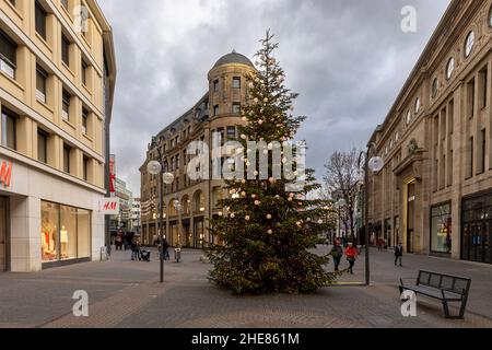 Traditional German Christmas Market in Cologne attracting visitors Stock Photo