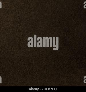 Closeup fragment of synthetic dense and smooth very dark green material Stock Photo