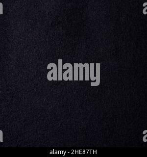Fragment of synthetic dense and smooth dark black material Stock Photo