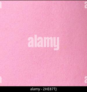 Fragment of synthetic dense and smooth very dark pink material Stock Photo