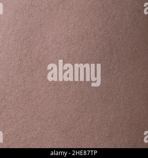 Fragment of synthetic dense and smooth very dark brown material Stock Photo