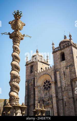 Facade and obelisk of the Se Cathedral in Porto, Portugal Stock Photo