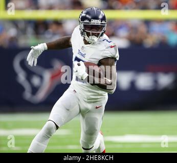 January 9, 2022: Houston Texans wide receiver Nico Collins (12) carries the  ball after a catch during an NFL game between the Texans and the Titans on  Jan. 9, 2022 in Houston