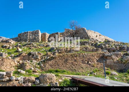 The ancient Bronze age mountaintop fortress of the Mycenaeans in the Peloponnese of Greece, Mycenae. Stock Photo