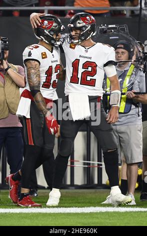 Tampa Bay, Florida, USA, January 1, 2023, Tampa Bay Buccaneers Wide  Receiver Mike Evans #13 receives a pass from Tom Brady and make a touch  down at Raymond James Stadium. (Photo Credit: