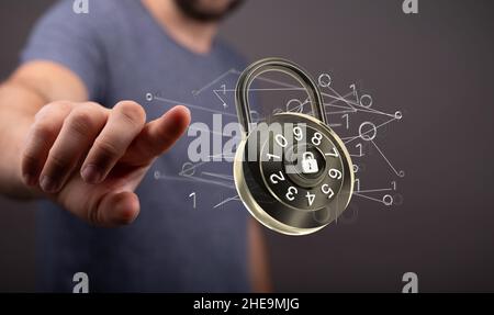Shallow focus of a human hand pointing on a safe lock icon, cybersecurity and information protection Stock Photo