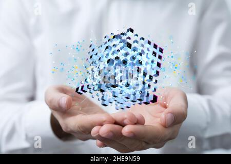 Shallow focus of human hands holding abstract icons, data Internet infrastructure concept Stock Photo