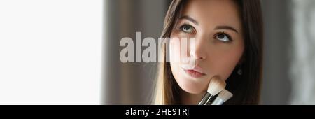 Brunette worker in room Stock Photo