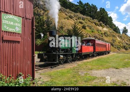 Oamaru Steam and Rail Society  Red shed and steam train in Otago, South Island New Zealand Stock Photo