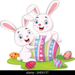 Cute two little bunnies with Easter egg in the grass Stock Vector
