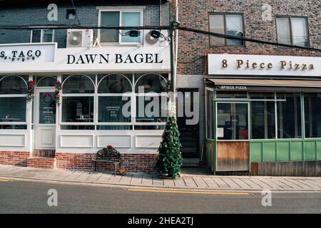 Seoul, Korea - January 3, 2022 : Itaewon Haebangchon restaurant pub cafe street Stock Photo